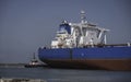 PORT ARANSAS, TX - 26 FEB 2023: Oil Tanker Ship sails and tugboat