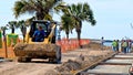 PORT ARANSAS, TX - 29 FEB 2020: Yellow front loader at construction site Royalty Free Stock Photo