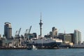 Roll-on/roll-off ships moored at Port of Auckland and coastal cityscape of skyscrapers in downtown, New Zealand