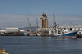 Port Authority building and fishing boats in port of Cape Town, South Africa. Royalty Free Stock Photo