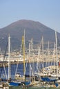 Port for boats and yachts on the boulevard in Chiaia, Molo san Vincenzo and Mount Vesuvius volcano, Naples, Italy Royalty Free Stock Photo