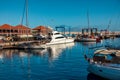 Port of boats and yachts with reflection in the water, San Sebastian, Spain Royalty Free Stock Photo