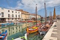 Port canal with wooden sailboats in Cesenatico, Emilia Romagna,