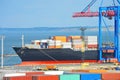 Port cargo crane, ship and container Royalty Free Stock Photo