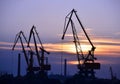 Port cargo crane at sunset Royalty Free Stock Photo