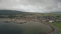 Port citycsape with modern, historic buildings at ocean bay aerial. Ships, yachts at pier city