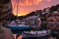 Port de Cala Figuera with ships and boats during sunset Royalty Free Stock Photo