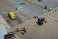 Port Dock workers and cruise ship crew working hard setting up a ramp to transport passengers off the ship