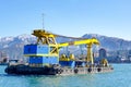 Port floating crane barge, pantone loader. Royalty Free Stock Photo