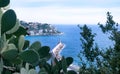 Port of the French city of Nice. Beautiful mountains, the port, the lighthouse and the turquoise sea.