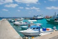 Port full of small fishermen`s and cargo boats