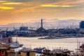 The Port of Genova and the lighthouse at sunset, Italy