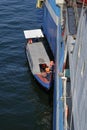 The Port Gentil Pilot Boat alongside the Seismic Vessel M V Symphony, loading the Pilot onboard Royalty Free Stock Photo