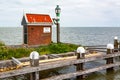 Port Guard`s cottage at the entrance to the Volendam Harbor Netherlands Royalty Free Stock Photo