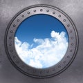Port Hole looking out onto blue sky Royalty Free Stock Photo