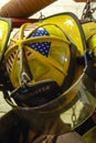 Bright yellow fire fighter helmet at a fire station house Royalty Free Stock Photo