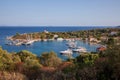 Port of Kastos island with moored yachts, sailboats, boats - Ionian sea, Greece in summer. Royalty Free Stock Photo