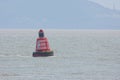 Port lateral light buoy in British channel Royalty Free Stock Photo