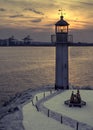 Port, lighthouse, sunset and two lovely birds.