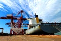 Port with loading cargo ship Royalty Free Stock Photo