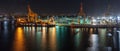 Port with loading cranes and cargo ships