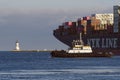 NYK Line Container Ship Tugboat and Lighthouse Royalty Free Stock Photo