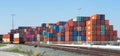 Stacked Containers and Train Tracks Royalty Free Stock Photo