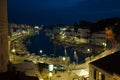 Port of menorca at dusk