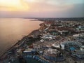 port near the shore on the background of a beautiful sunset. Mediterranean coast of Cyprus, Ayia NAPA Royalty Free Stock Photo