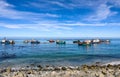 Marine Diamond mining boats offshore in small coastal town Royalty Free Stock Photo