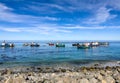 Marine Diamond mining boats offshore in small coastal town Royalty Free Stock Photo