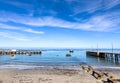 Old jetty harbour in small coastal town