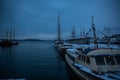 Port in Oslo Norway during sunset in winter view View of the sea and anchored boats Royalty Free Stock Photo