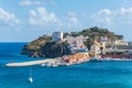 The port of the Ponza island in summer. Coloured houses, boats, ferry in the harbour of island of Ponza.