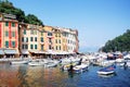 Port, Portofino, Italy,Genova, Liguria, 09 aug, 18: Walking tourists, cozy cafes, colored houses, boatsin the picturesque harbor.