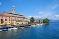 Port promenade with look at the cathedral Santa Maria Annunziata, Salo, Lake Garda.