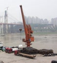 Port quay cranes are lifting cargo