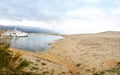 Port in sandy, rocky and dusty island.