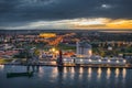 The port scenery of the Martwa Wisla and illuminated stadium in Gdansk at sunset. Poland