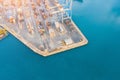 Port in the sea gulf, pier with metal containers, maritime traffic delivery concept Royalty Free Stock Photo