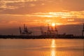 Panamax Shipping cranes at sunset in Southampton, England