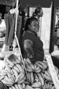 African American woman sells banana