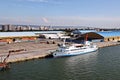 Port of Taichung, Taiwan. September, 24, 2020. Seagoing vessels, tugboats at the port under cargo operations and underway.