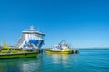 Port of Tauranga pilot boats and large cruise liner berthed at Mount Maunganui wharf