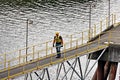 Port of Vancouver, WA, USA. August,21, 2020. Shore dockers work on the berth with ship ropes during the mooring operation of a bul