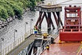 Port of Vancouver, WA, USA. August,21, 2020. Shore dockers work on the berth with ship ropes during the mooring operation of a bul