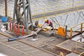 Port of Vancouver, WA, USA. August,21, 2020. Shore dockers work on the berth with ship ropes during the mooring operation of a bul