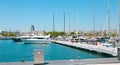 Port Vell in Barcelona, motor yachts in marina Royalty Free Stock Photo