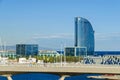 Port Vell with its bridge Porta d`Europa, W Barcelona and Nautic Center Royalty Free Stock Photo