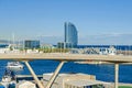 Port Vell with its cruise terminal, bridge Porta d`Europa, Nautic Center and W Barcelona